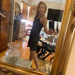 Brand new. Never worn Gray tennis/ Pickleball activity dress , attached shorts.